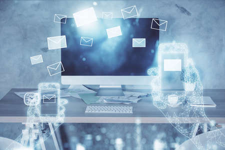 Multi exposure of envelops drawings and office interior background. E-mail concept.の写真素材