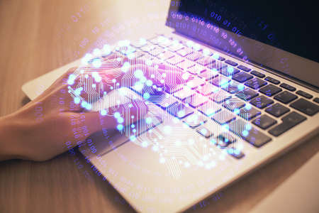 Multi exposure of woman hands working on computer and brain hologram drawing. Ai concept.の写真素材