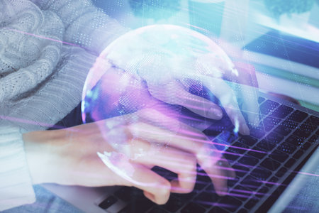 Double exposure of woman hands typing on computer and technology theme drawing. High Tech concept.