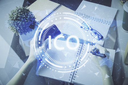 Multi exposure of woman on-line shopping holding a credit card and crypto theme drawing. Blockchain E-commerce concept.の写真素材