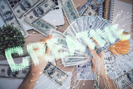 Multi exposure of creative drawing hologram and USA dollars bills and man hands. Start up conceptの写真素材