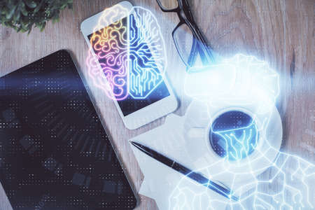 Double exposure of drawing man in AR glasses over table with phone. Top view. VR concept.の写真素材