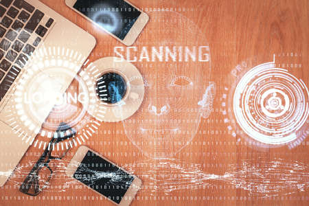 Double exposure of technology theme drawing over work table desktop. Top view. Global data analysis concept.の写真素材