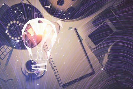 Double exposure of bulb drawing and work table top veiw. Concept of idea.