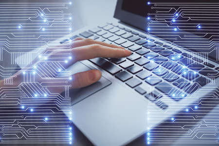 Double exposure of woman hands typing on computer and technology theme drawing. High Tech concept.