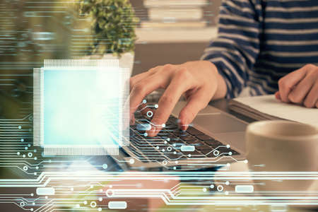 Double exposure of woman hands working on computer and data theme hologram drawing. Tech concept.