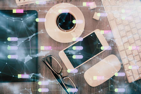 Multi exposure of technology theme drawing over work table desktop. Top view. Global data analysis concept.の写真素材