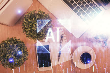 Double exposure of technology theme drawing over work table desktop. Top view. Global data analysis...