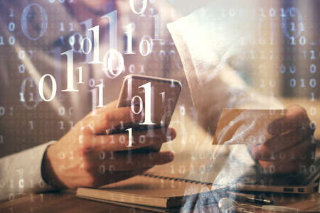 Multi exposure of man's hands holding and using a digital device and data theme drawing. Innovation concept.の写真素材