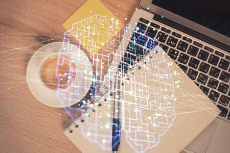 Multi exposure of brain sketch hologram over topview work table background with computer. Concept of...