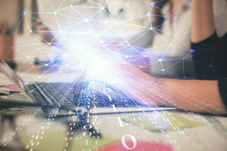 Multi exposure of woman hands working on computer and data theme hologram drawing. Tech concept.の写真素材