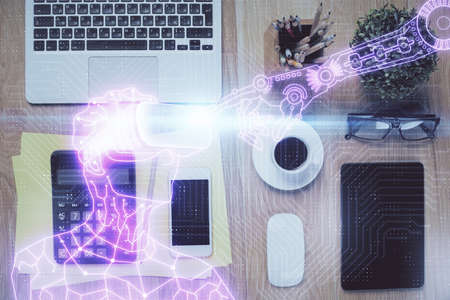 Double exposure of drawing man in AR glasses over table with phone. Top view. VR concept.の写真素材