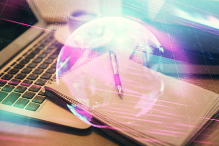 Double exposure of technology theme drawing and desktop with coffee and items on table background. Concept of high tech.の写真素材