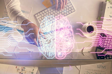 Double exposure of man's hands typing over computer keyboard and brain hologram drawing. Top view. Ai and data technology concept.の写真素材