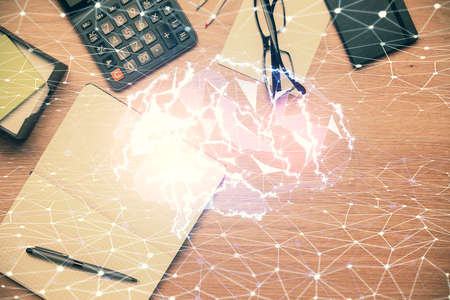 Double exposure of brain sketch and table top veiw. Concept of data analysis.