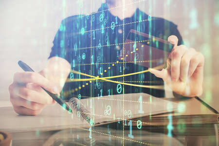 Double exposure of man hands holding a credit card and data theme drawing. E-commerce and technology...