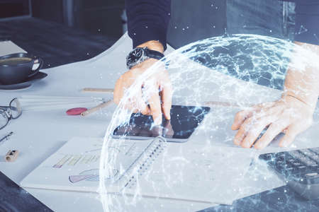 Double exposure of man's hands holding and using a phone and social network theme drawing.