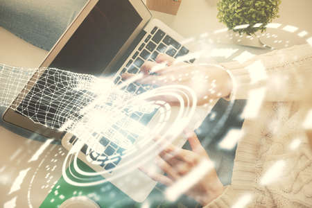 Double exposure of woman hands working on computer and data theme hologram drawing. Top View....