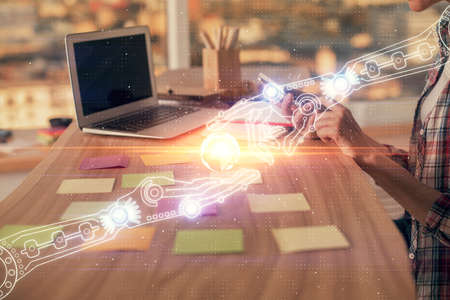 Multi exposure of woman hands working on computer and data theme hologram drawing. Tech concept.