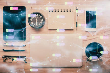 Multi exposure of technology theme drawing over work table desktop. Top view. Global data analysis...