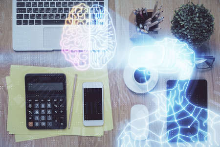 Double exposure of drawing man in AR glasses over table with phone. Top view. VR concept.の写真素材