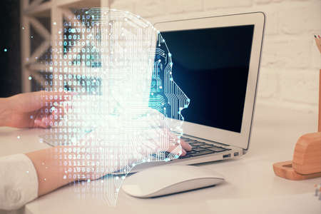 Multi exposure of woman hands working on computer and brain hologram drawing. Ai concept.の写真素材