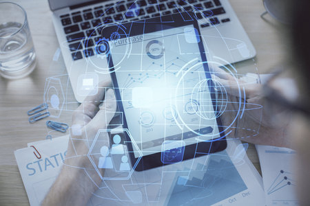 Double exposure of man's hands holding and using a phone and social network theme drawing.