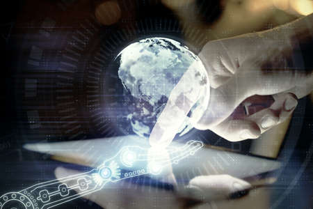 Multi exposure of man's hands holding and using a digital device and map drawing. International business concept.の写真素材