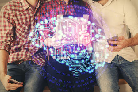 Double exposure of man and woman working together holding and using a mobile device and brain...