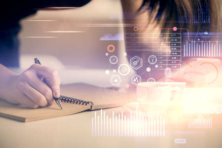 Double exposure of technology sketch hologram and woman holding and using a mobile device.