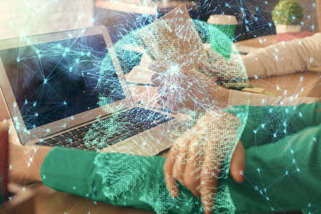 Double exposure of man and woman working together and brain drawing hologram. Intellectual...