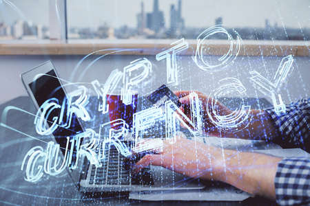 Double exposure of man hands holding a credit card and crypto business theme drawing. Digital blockchain and E-commerce concept.の写真素材