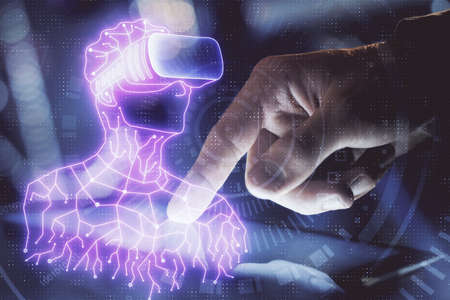 Double exposure of man's hands holding and using a digital device and AR glasses drawing. Virtual...