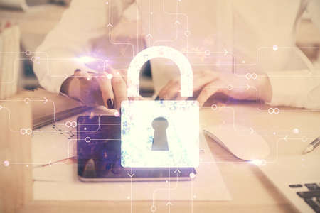 Double exposure of lock sketch hologram and woman holding and using a mobile device. Security iT...