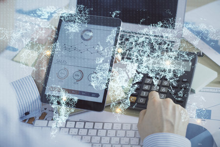 Double exposure of man's hands holding and using a phone and social network theme drawing.