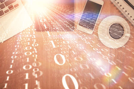 Double exposure of technology theme drawing over work table desktop. Top view. Global data analysis...