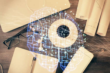 Multi exposure of brain sketch hologram over topview work table background with computer. Concept of...