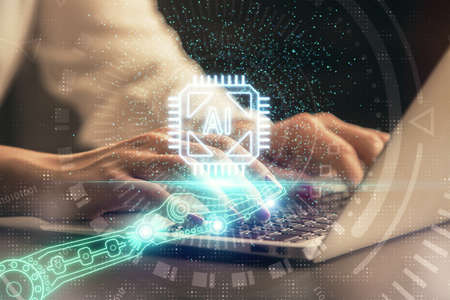 Multi exposure of woman hands working on computer and data theme hologram drawing. Tech concept.の写真素材