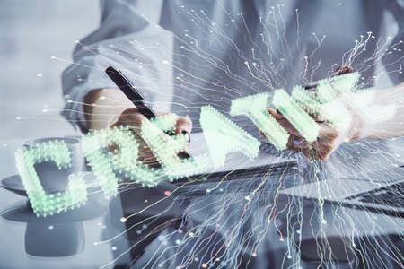Double exposure of creative hologram and woman holding and using a mobile device. Start up concept.