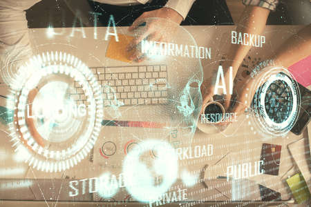 Double exposure of man and woman working together and data theme hologram drawing. Computer...