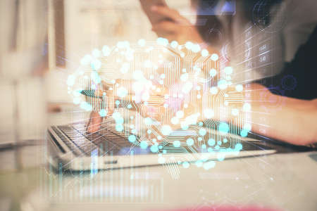 Multi exposure of woman hands working on computer and brain hologram drawing. Ai concept.