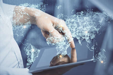 Double exposure of man's hands holding and using a phone and social network theme drawing.の写真素材