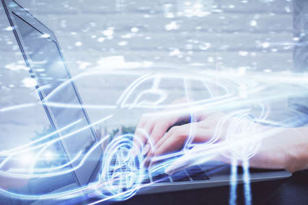 Double exposure of woman hands typing on computer and automobile theme drawing. High Tech concept.の写真素材