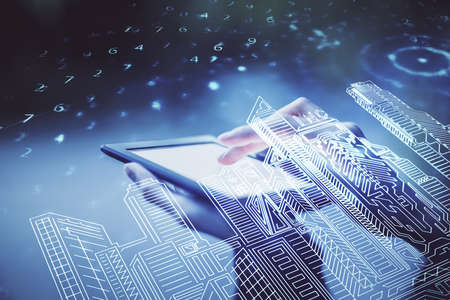 Double exposure of buildings hologram and woman holding and using a mobile device. Smart city...