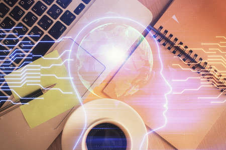 Double exposure of brain drawing hologram over topview work table background with computer. Concept of big data.の写真素材