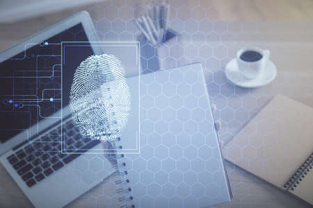Double exposure of woman hands typing on computer and fingerprint drawing. Security concept.