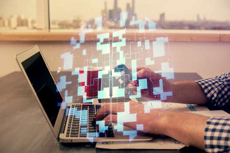 Double exposure of man hands holding a credit card and data theme drawing. E-commerce and technology...