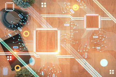 Double exposure of technology theme drawing over work table desktop. Top view. Global data analysis...