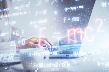 Double exposure of woman hands typing on computer and formula hologram drawing. Education concept.