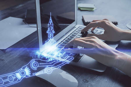 Double exposure of woman hands typing on computer and creative drawing. Start up concept.